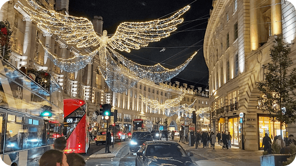 Regent Street in London dazzles with its iconic Christmas angel lights, creating a magical festive atmosphere for holiday shoppers and visitors.