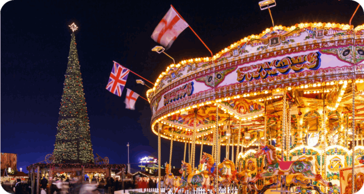 A brightly lit carousel and a towering Christmas tree bring festive magic to Hyde Park’s Winter Wonderland in London.