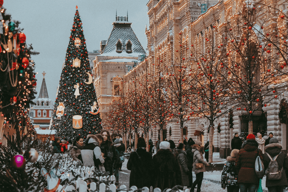 Festive lights and a grand Christmas tree create a magical holiday vibe - Best Places to Visit in December for Festive Fun.