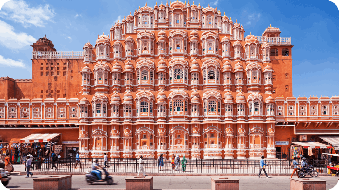 A stunning view of Jaipur’s iconic Hawa Mahal with its intricate façade and vibrant street life.